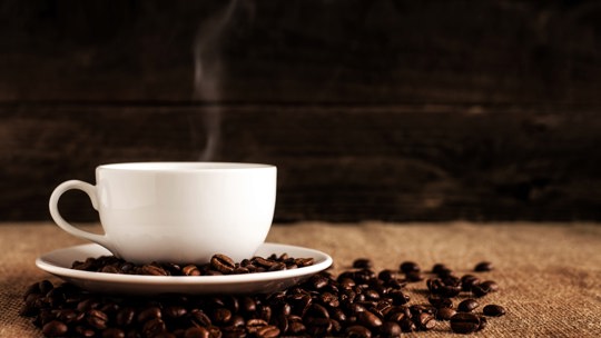 Coffee Beans Under Coffee Mug