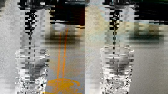 Commercial Espresso Machine Making Drink