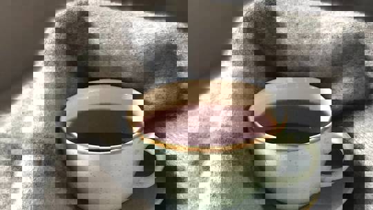 Coffee In Mug In Grey Blanket