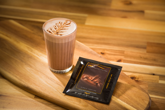 Hot Chocolate sachet next to hot chocolate