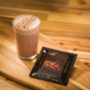 Hot Chocolate sachet next to hot chocolate