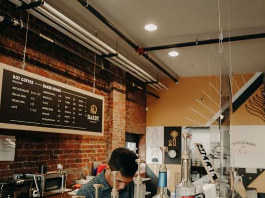 Man Working In Coffee Shop2
